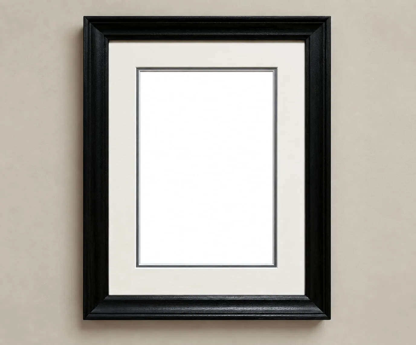 A black picture frame with a white mount in portrait format