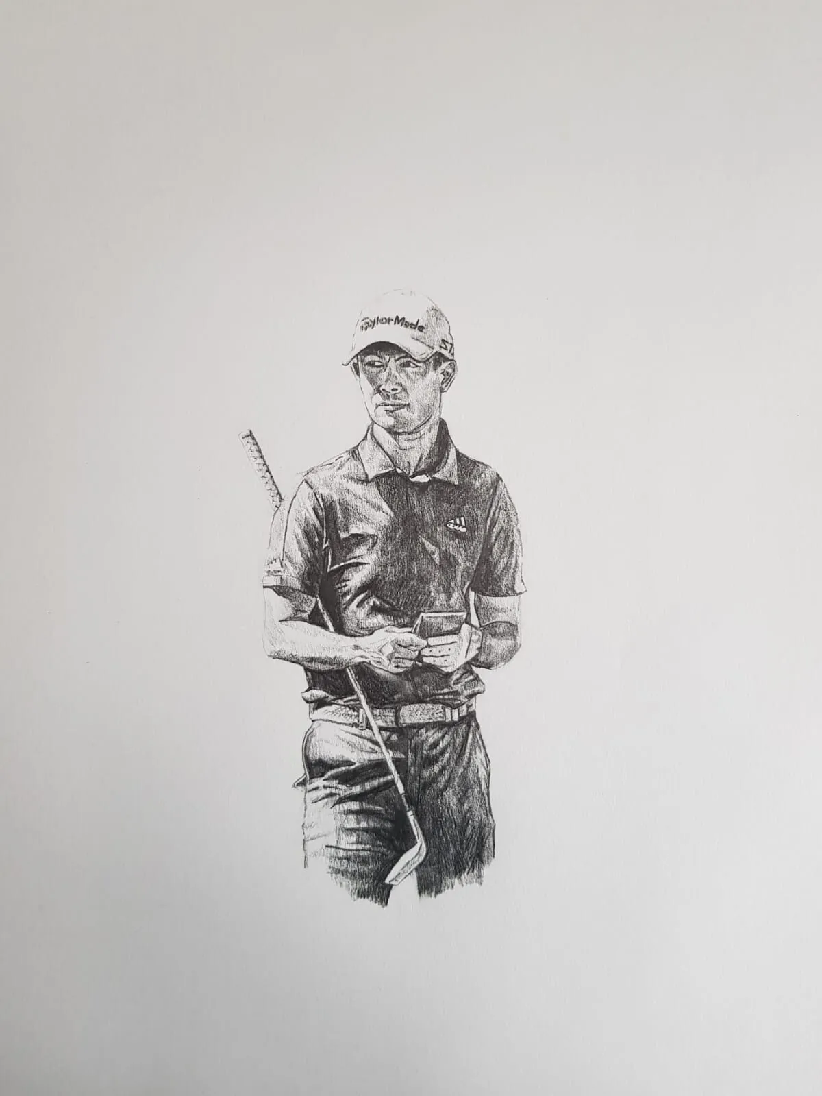 A graphite drawing of a golfer holding a club